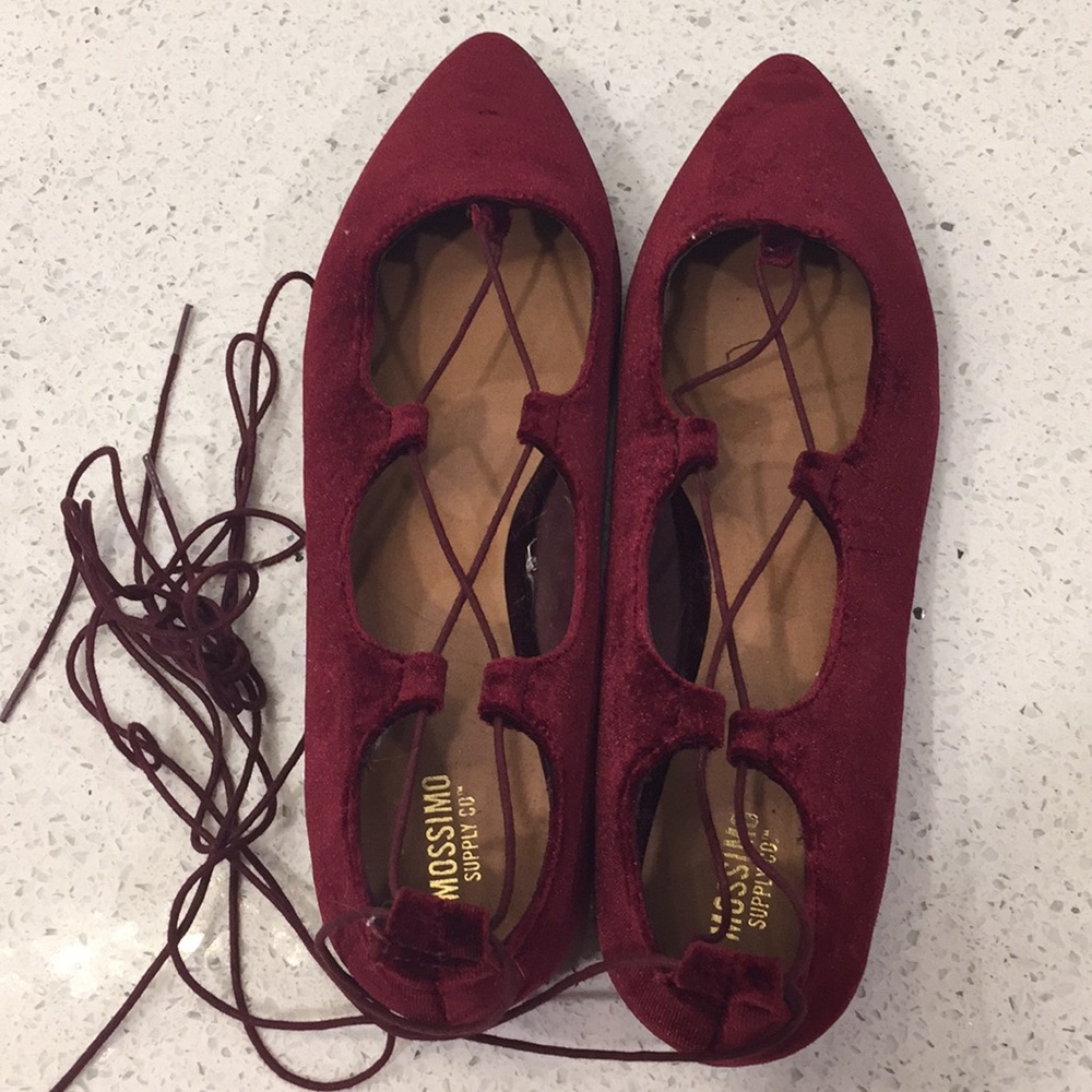 velvet maroon lace-up flats.